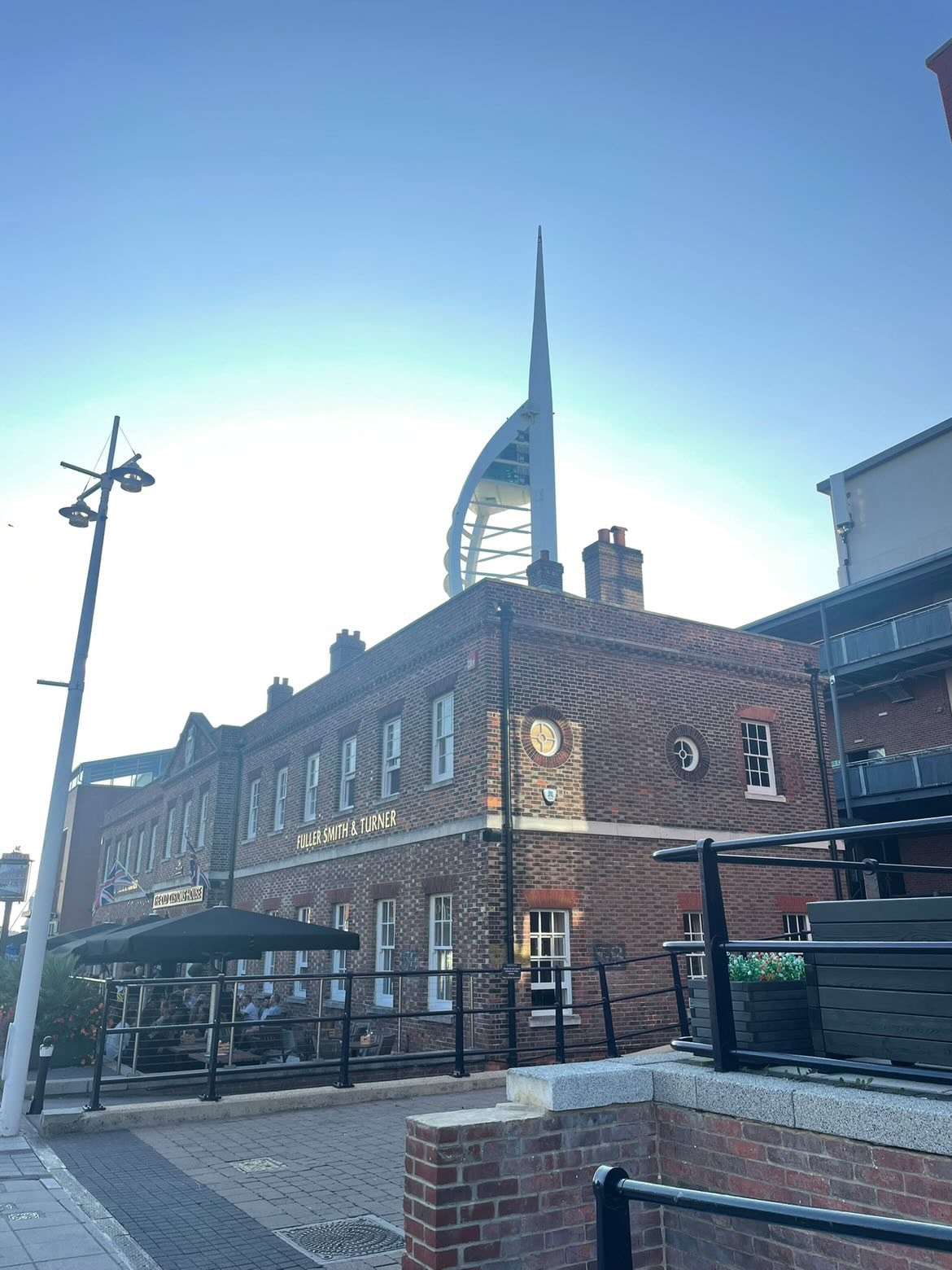 Old Portsmouth — historic brick building with sail-shaped spire